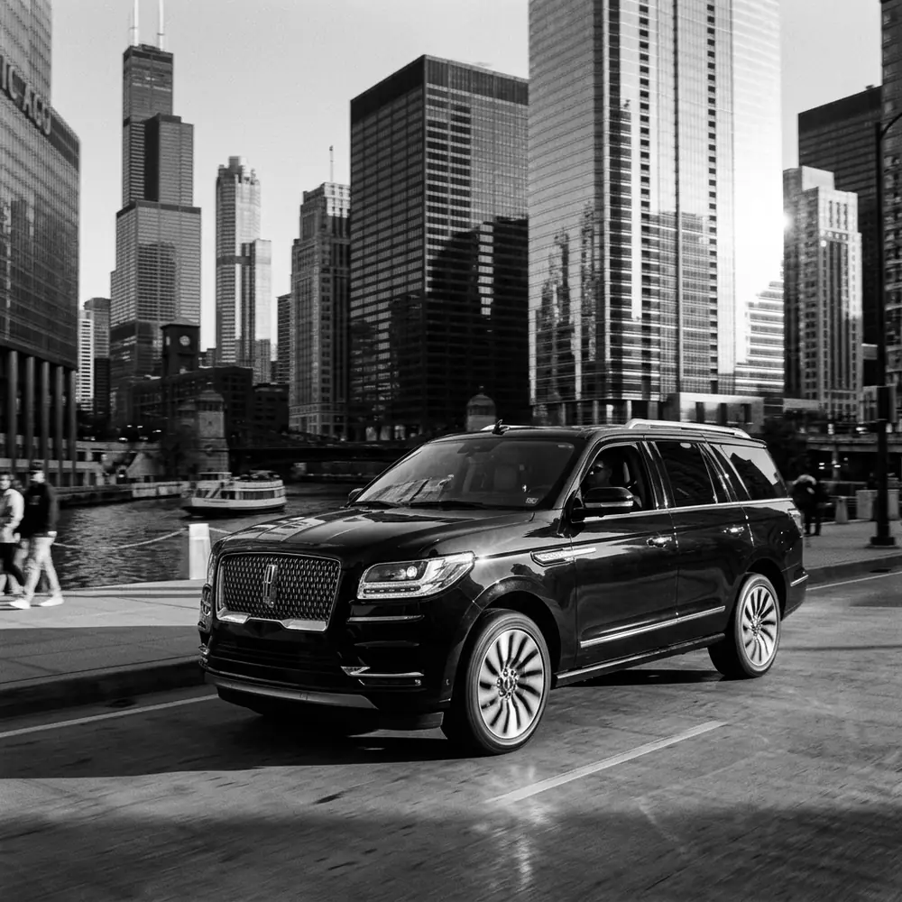 Black Lincoln Navigator by the Chicago Riverwalk downtown